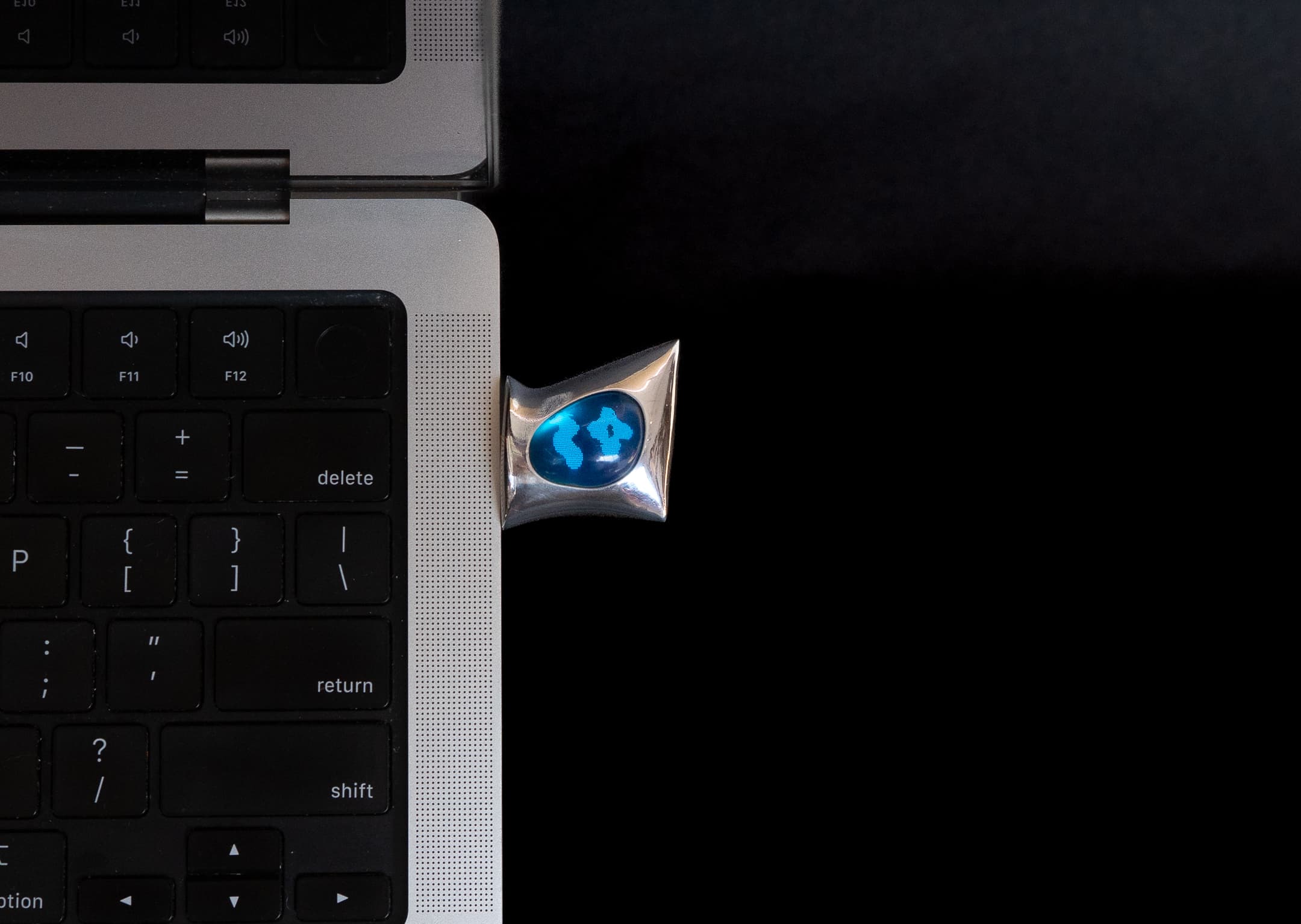 PUFF plugged into a computer in a studio setting.