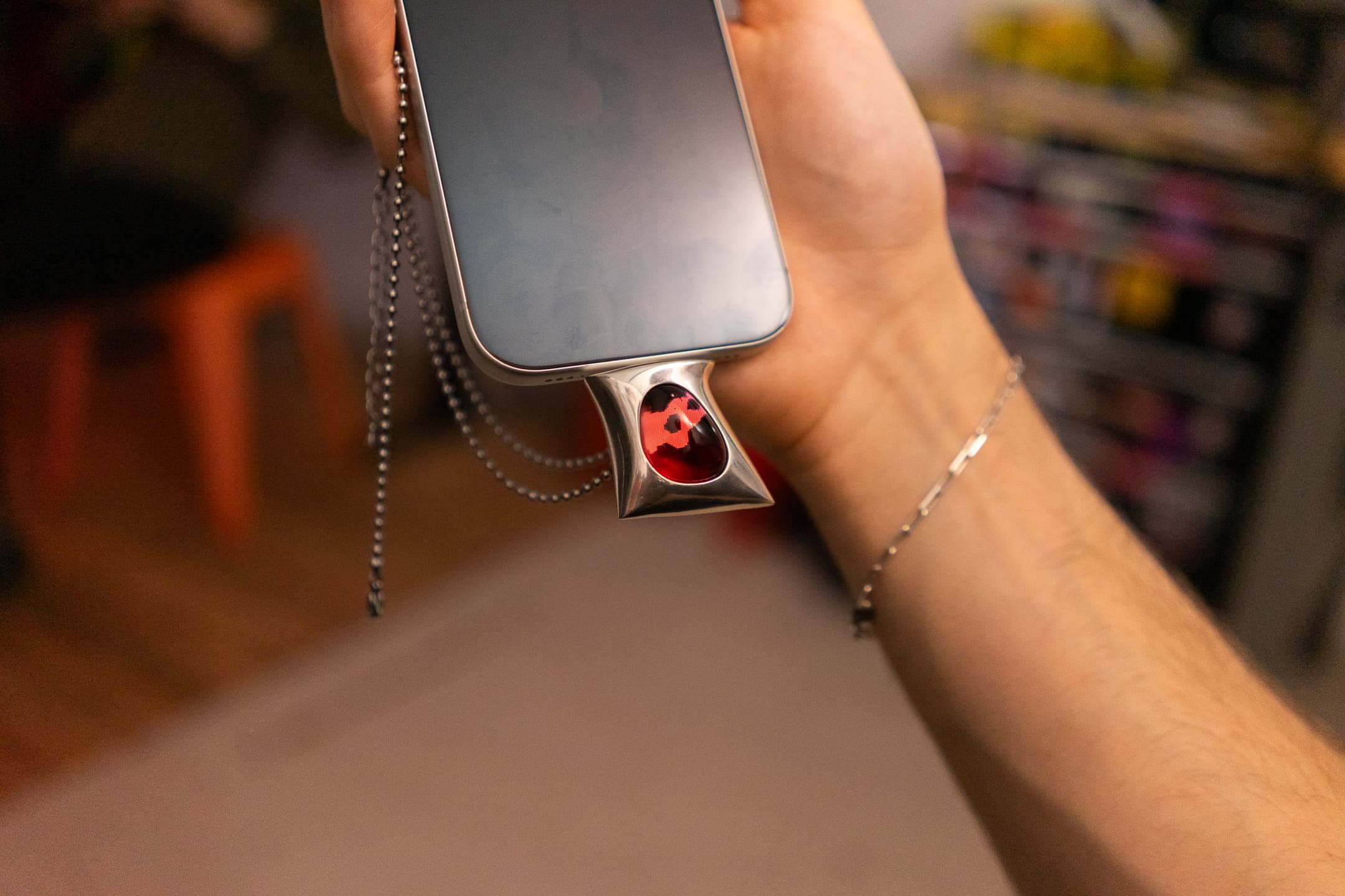 PUFF attached to a phone in a studio setting.